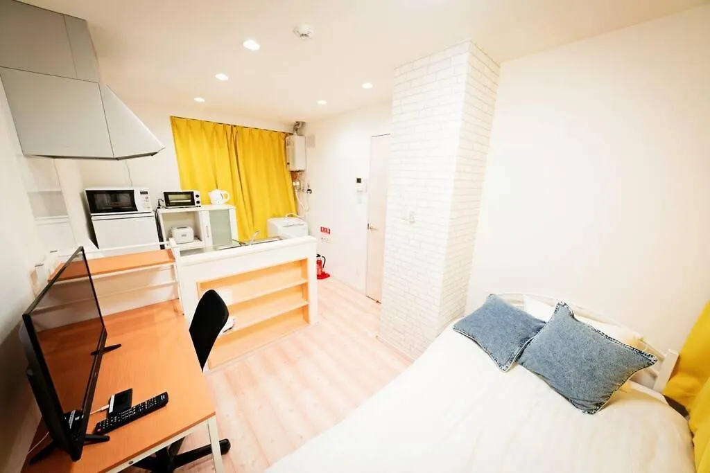 明るい室内で美室を提供　サービスアパ―トメントsapporo南8条 Apartment