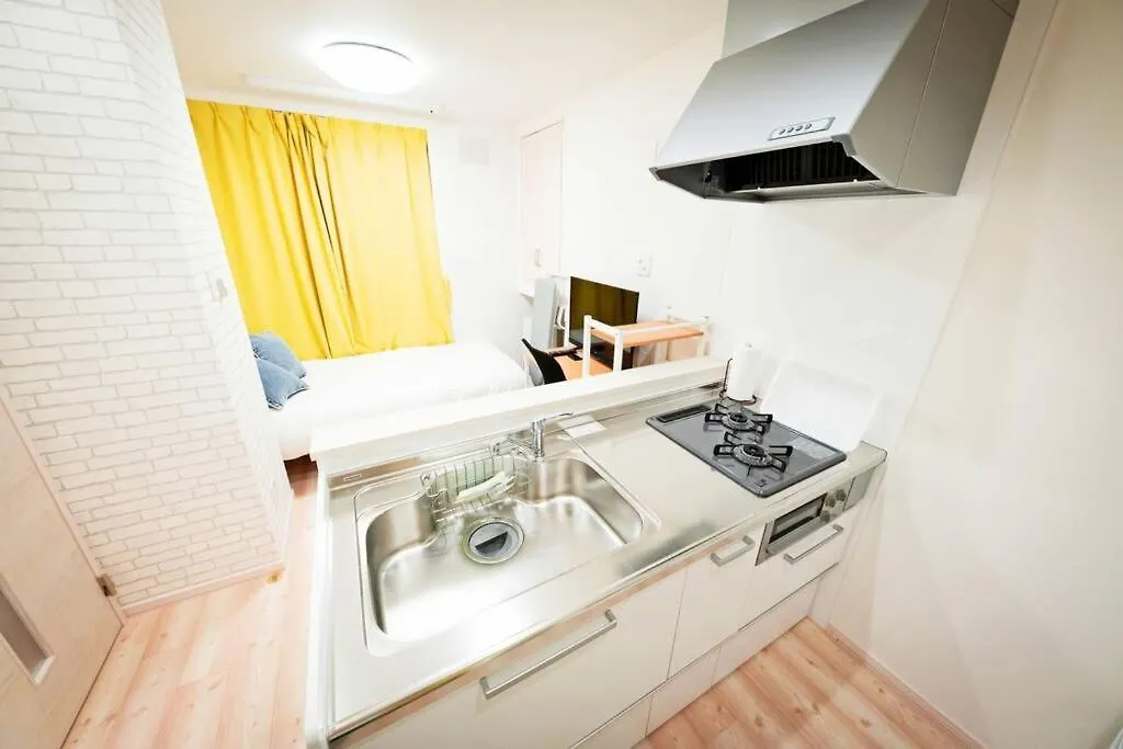 明るい室内で美室を提供　サービスアパ―トメントsapporo南8条 Apartment