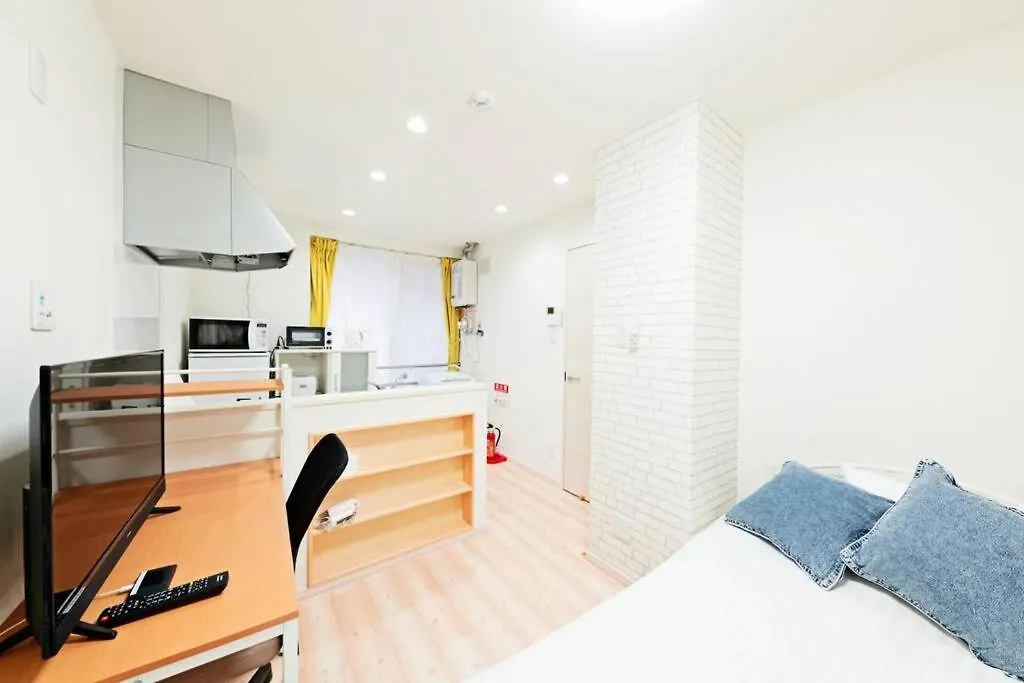 明るい室内で美室を提供　サービスアパ―トメントsapporo南8条 Apartment