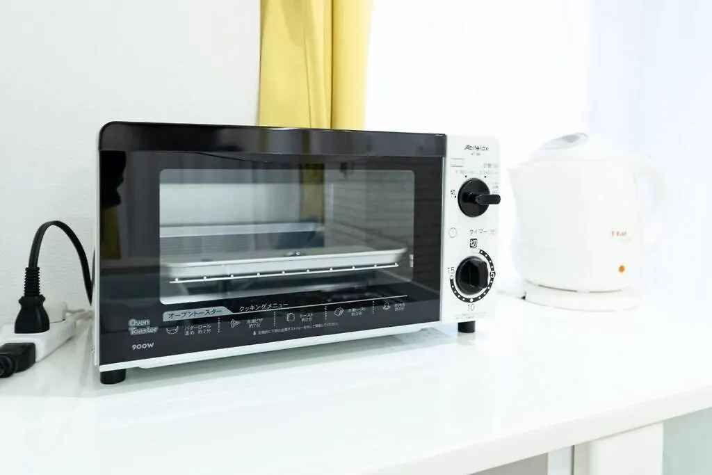 明るい室内で美室を提供　サービスアパ―トメントsapporo南8条 Apartment